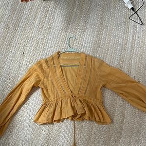 Free people yellow v-neck blouse!